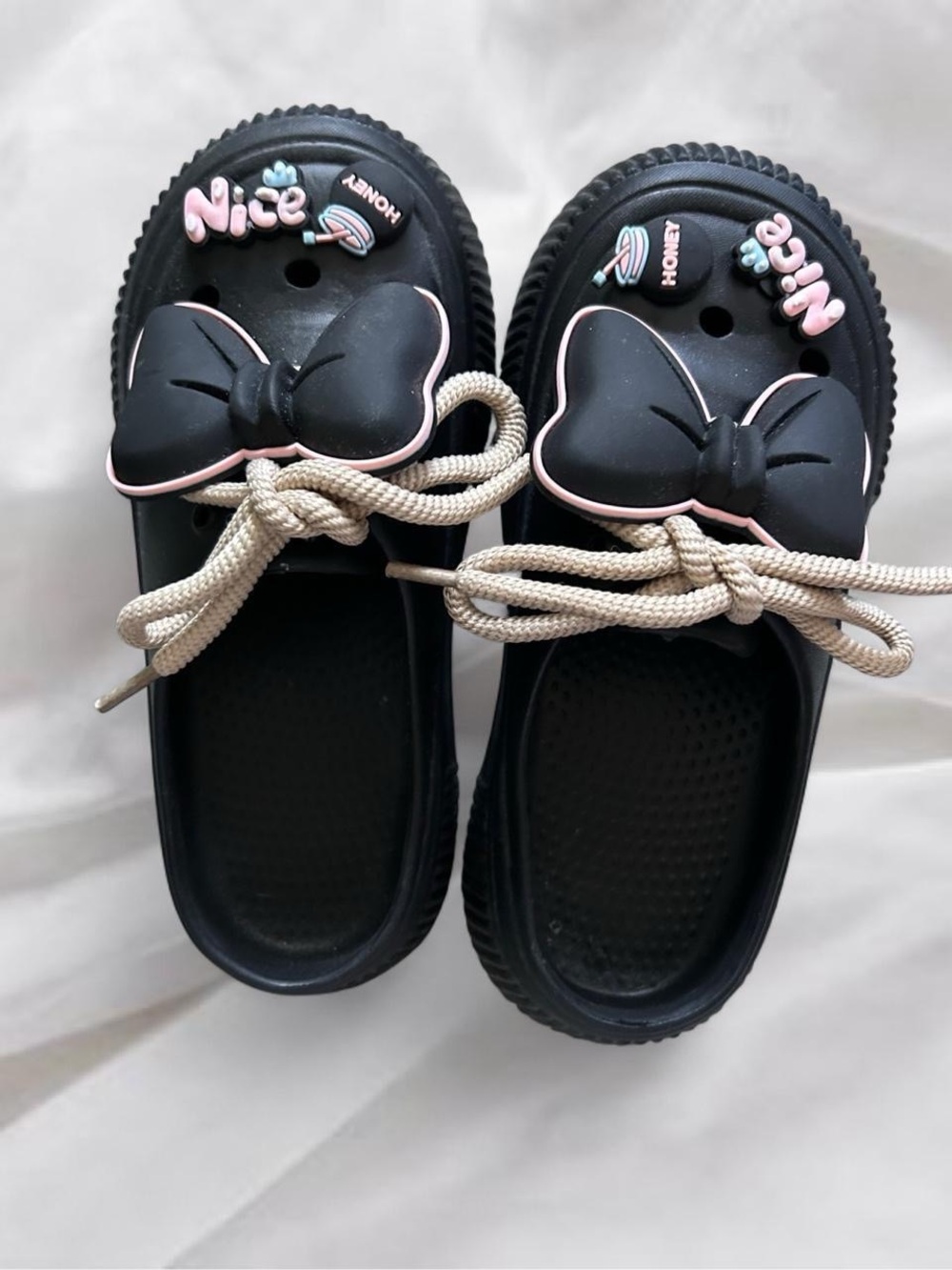 Black Bow Jelly Clogs with Pink Trim and Charms